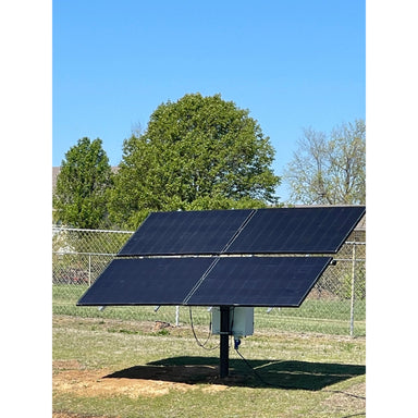 Outdoor Water Solutions Aerify Solar Solar panels on a stand with trees and clear sky in the background
