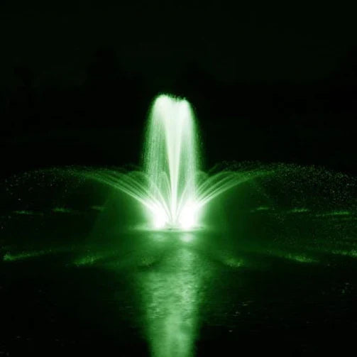 Airmax Ecoseries with Crown and Trumpet Spray pattern in pond at night with green lights