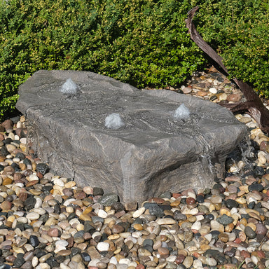 Blue Thumb Manistique Falls GFRC boulder fountain in Dapple Gray