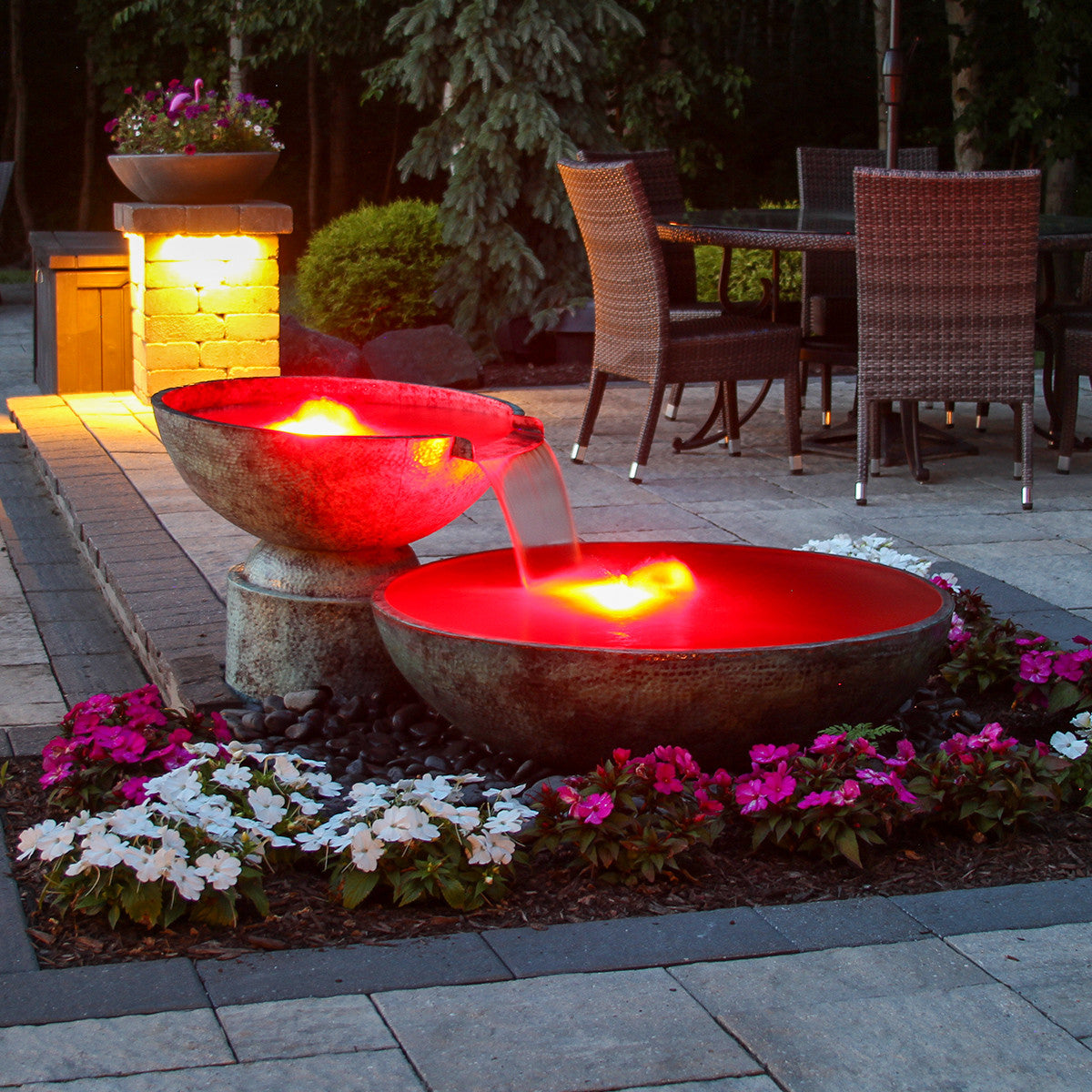 Double spillway bowl fountain lit at night