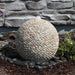 Tan pebbled sphere fountain