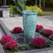 Blue Thumb 42.5 inch tall hammered brass round spillway urn fountain with aqua patina