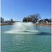 Outdoor Water Solutions Commercial Aerating Fountain in a pond with a clear blue sky