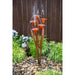 Blue Thumb copper fountain with orange glass trumpet flowers