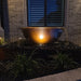 Sugar kettle fountain lit at night